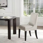 Chaise de salle à manger tapissée Spruce&Spring avec coussin d'assise double épaisseur et pieds en bois