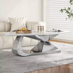 Table basse à plateau en céramique avec piètement contemporain en acier inoxydable - Une pièce maîtresse durable et élégante pour votre salon.