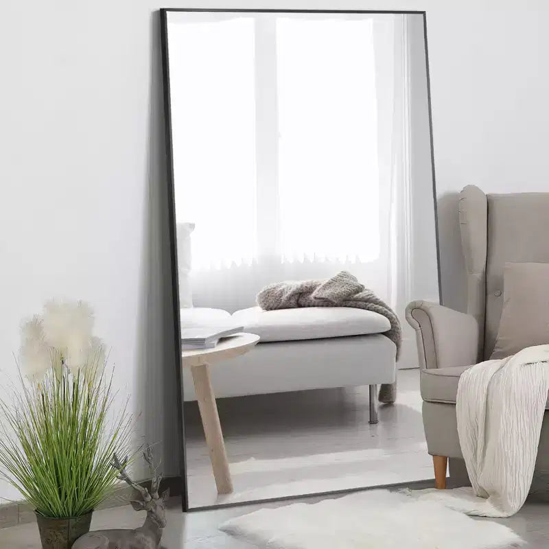 Grand miroir de sol Dovelina 71x32, cadre noir