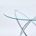 Table à manger avec pied en métal chromé et plateau en verre trempé, design moderne et compact pour la cuisine ou le salon