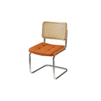 Chaise de salle à manger moderne en similicuir marron avec dossier tissé et piètement cantilever