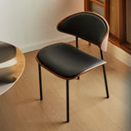 Chaise de salle à manger à dossier incurvé en cuir noir