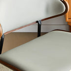 Chaise de salle à manger à dossier incurvé en cuir noir