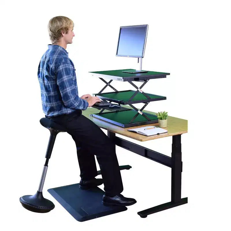 Chaise de bureau debout Wobble en vinyle noir - Uncaged Ergonomics