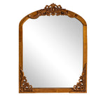 Miroir sur pied en bois massif sculpté en plein cintre